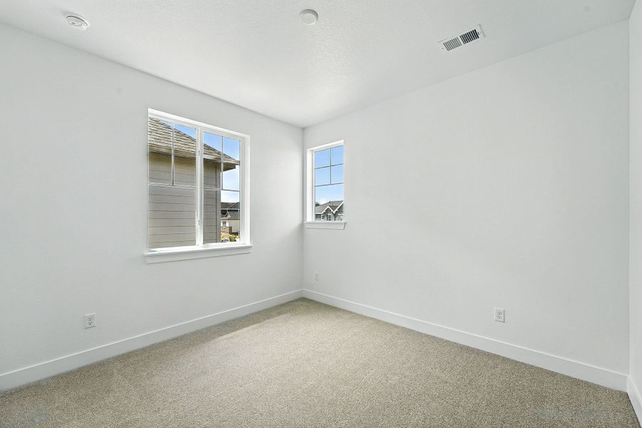 Spacious, unfurnished interior of a new home in Macanta, Castle Rock (Image 30).