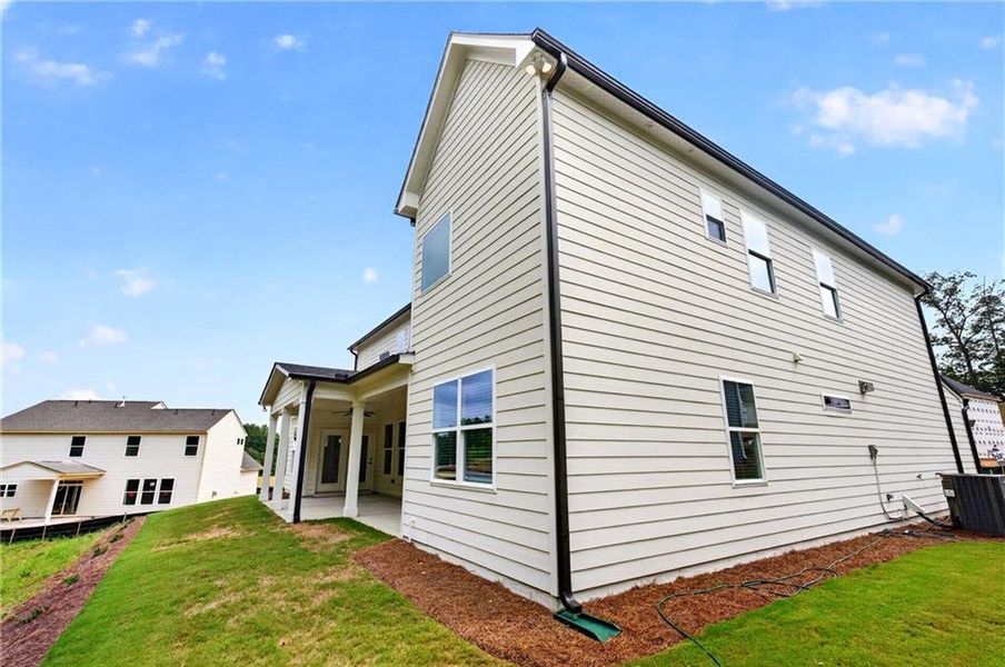 Exterior details and patio area of a home in Arbor West, Dawsonville (Image 31).