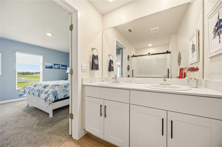 Furnished interior view inside a new home in Central Parc, North Port (Image 38).