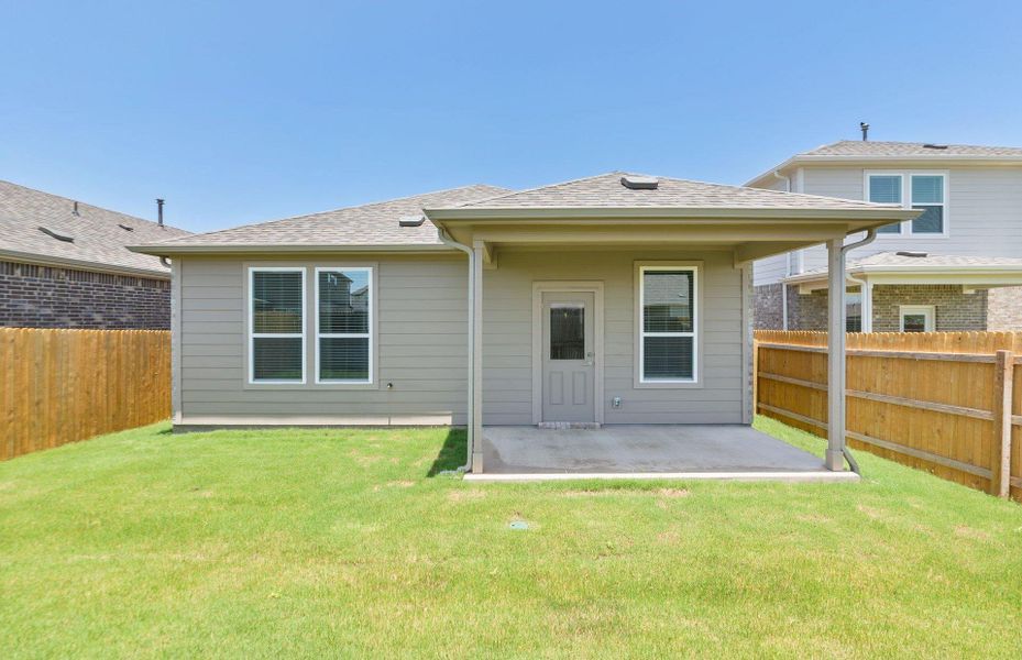 Exterior details and patio area of a home in Crosswinds, Kyle (Image 3).