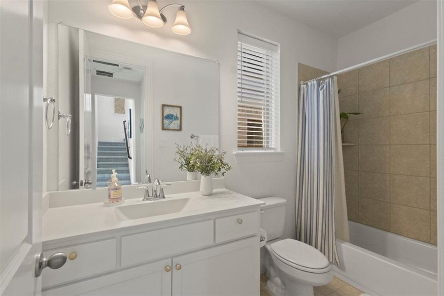 Furnished interior view inside a new home in Mustang Lakes 74', Celina (Image 15).