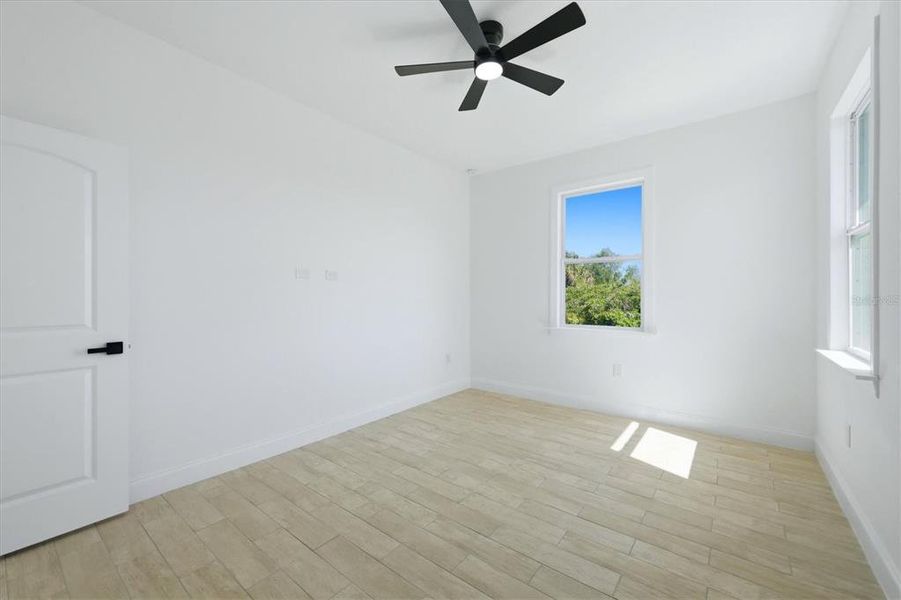 Spacious, unfurnished interior of a new home in , Placida (Image 13).