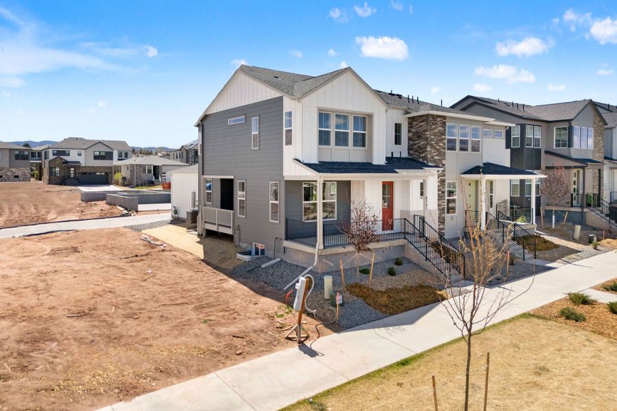 Front exterior of a new home in Trumark Homes at Sterling Ranch, Littleton, CO, highlighting curb appeal (Image 2).