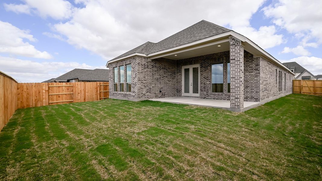 Exterior details and patio area of a home in Crosswinds, Kyle (Image 25).