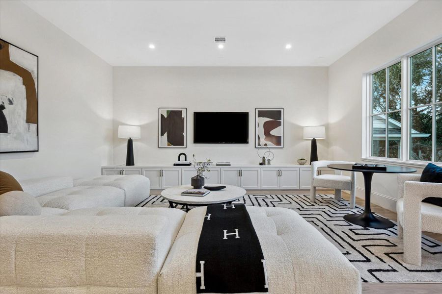 [Game Room/Media] Serves as a versatile second living area ideal for media, lounging, or casual gatherings.