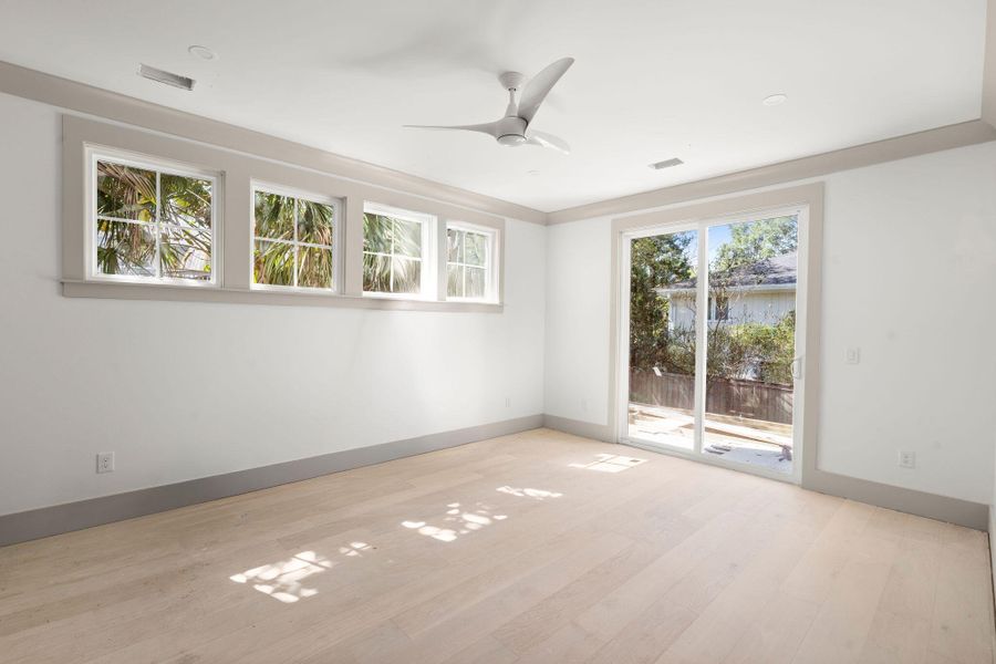 Spacious, unfurnished interior of a new home in , Isle Of Palms (Image 11).