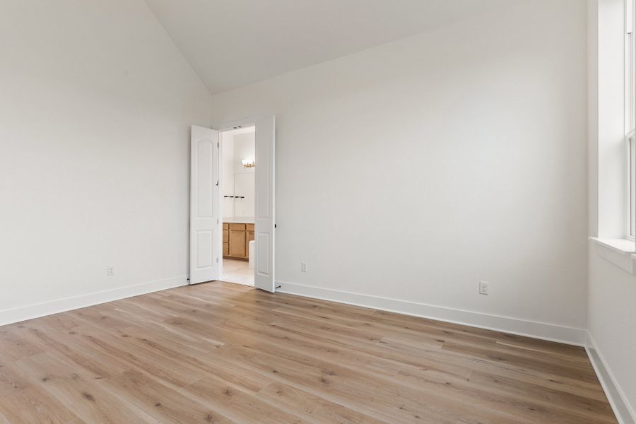 Representative unfurnished interior of a home built from the Waterville by Ashton Woods in The Trails at Carmel, Pflugerville (Image 49).
