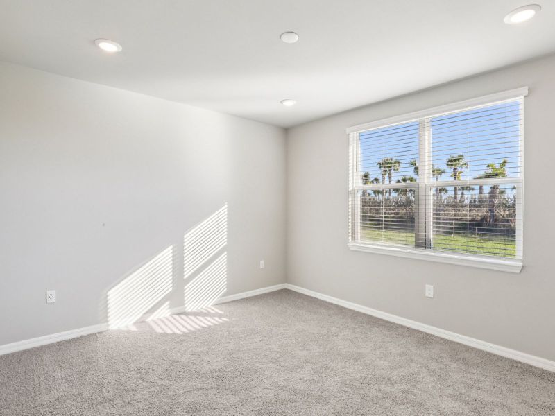 Spacious, unfurnished interior of a new home in Crescent Lakes - Premier Series, Punta Gorda (Image 11). Spacious, unfurnished interior of a new home in Crescent Lakes - Premier Series, Punta Gorda (Image 11).