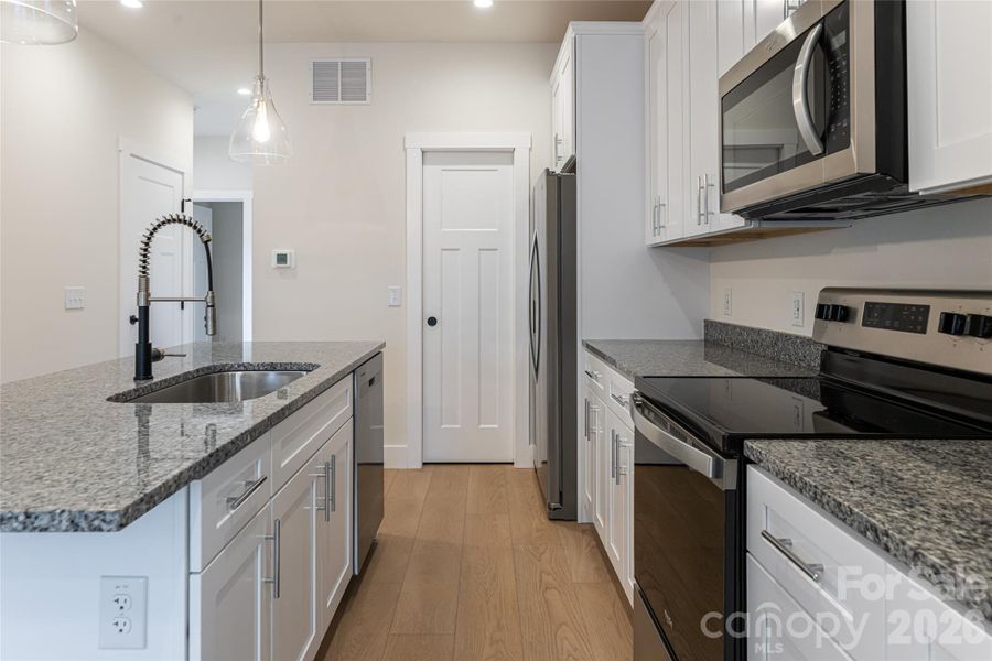 Furnished interior view inside a new home in , Asheville (Image 5).