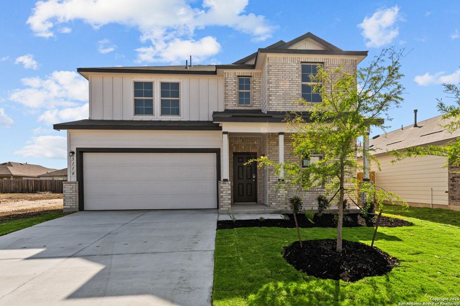 Front exterior of a new home in Blue Ridge Ranch, San Antonio, TX, highlighting curb appeal (Image 18). Front exterior of a new home in Blue Ridge Ranch, San Antonio, TX, highlighting curb appeal (Image 18).