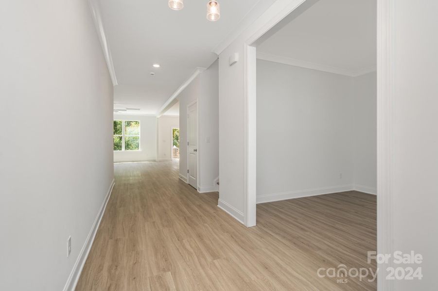 Representative Photo. Large & airy foyer hallway