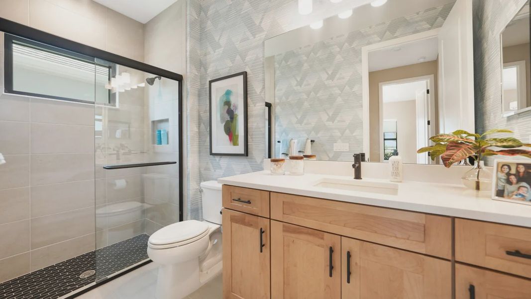 Representative furnished interior of a home built from the Artistry by Neal Communities in SkySail, Naples (Image 6).