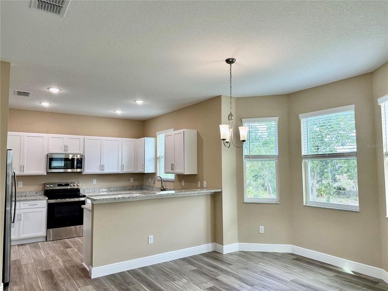 Furnished interior view inside a new home in , Weeki Wachee (Image 16).