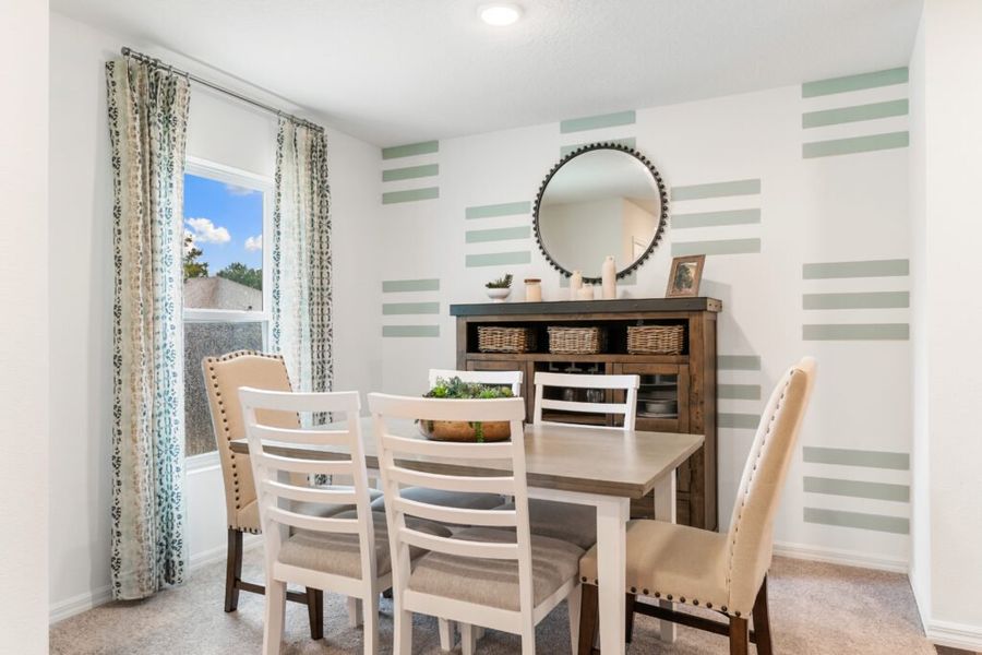 Representative furnished interior of a home built from the Alexander by Holiday Builders in Poinciana, Poinciana (Image 5).