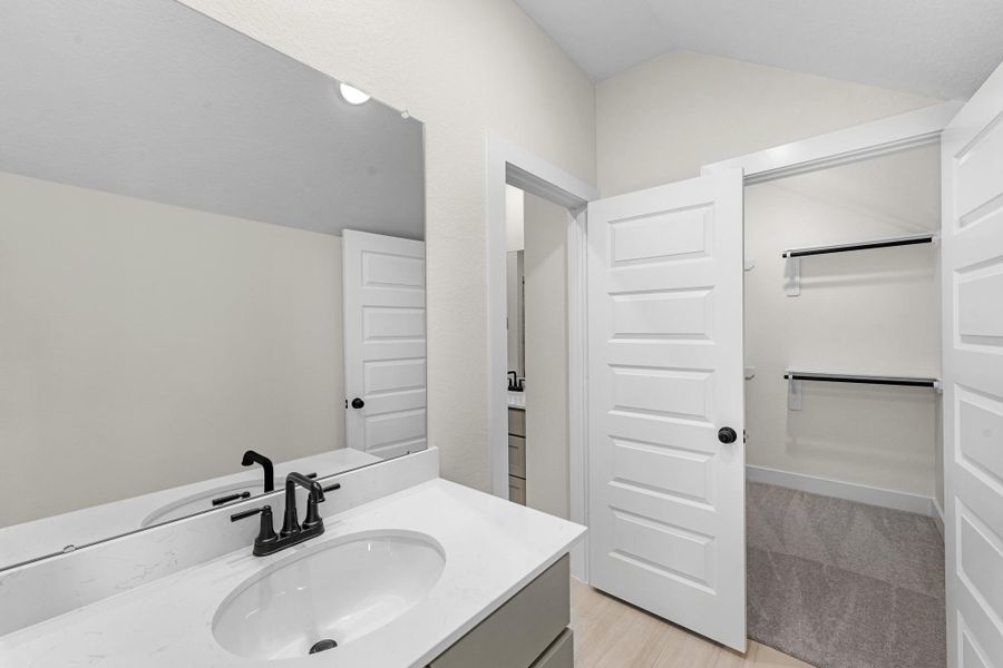 Furnished interior view inside a new home in Bridgeland, Cypress (Image 18).