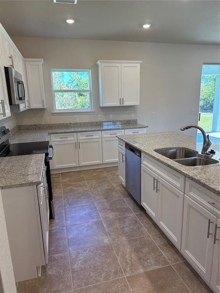 Furnished interior view inside a new home in , North Port (Image 5).