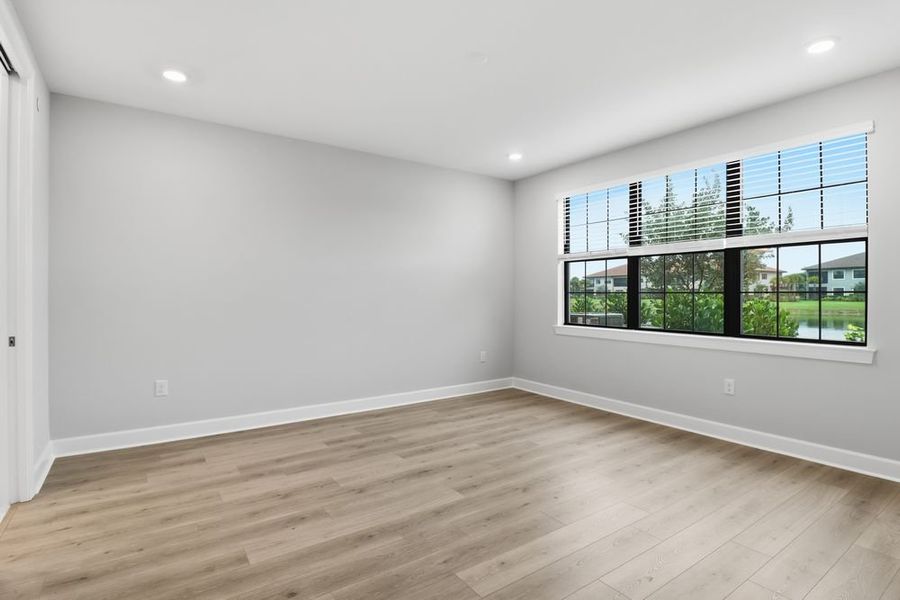 Spacious, unfurnished interior of a new home in Esplanade by the Islands Coach Homes, Naples (Image 10).