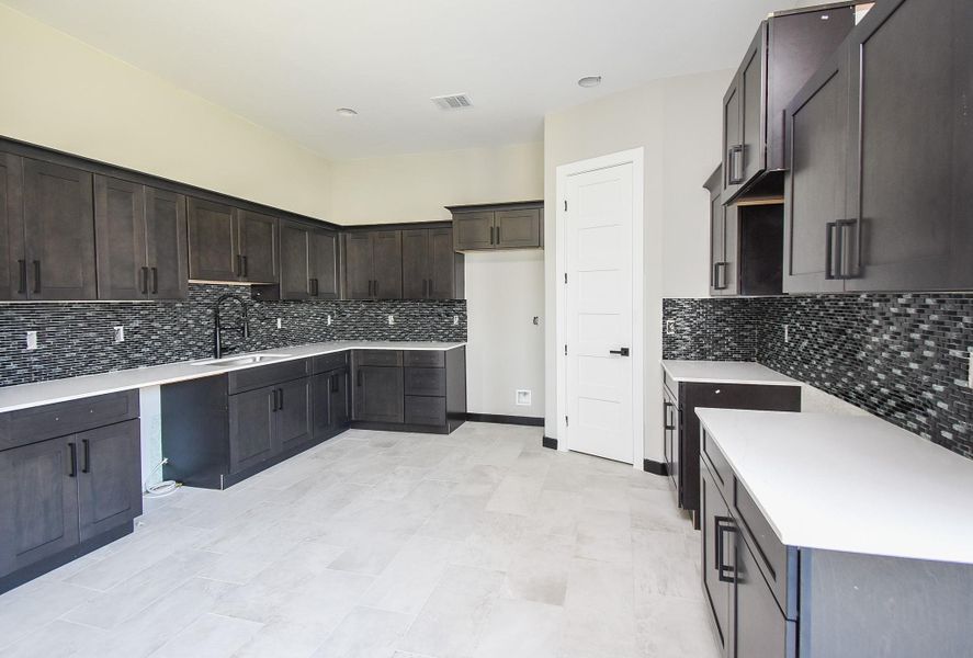 Kitchen and Breakfast area is huge! Lots of Cabinets and Counterspace and open area. Kitchen and Breakfast area is huge! Lots of Cabinets and Counterspace and open area.