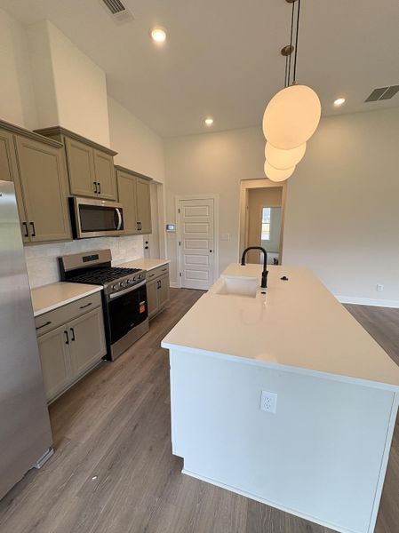 Furnished interior view inside a new home in Villages of Green Meadows, Munford (Image 8).