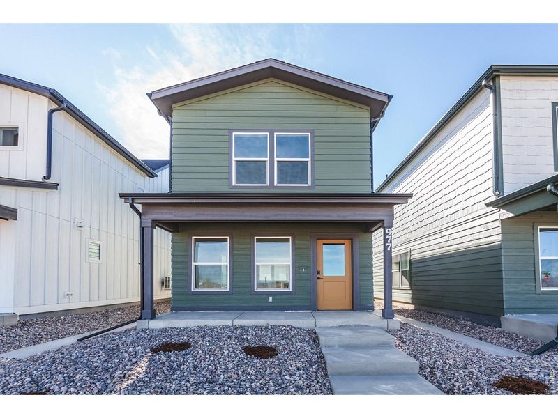 Front exterior of a new home in Prairie Song Cottages, Windsor, CO, highlighting curb appeal (Image 22).
