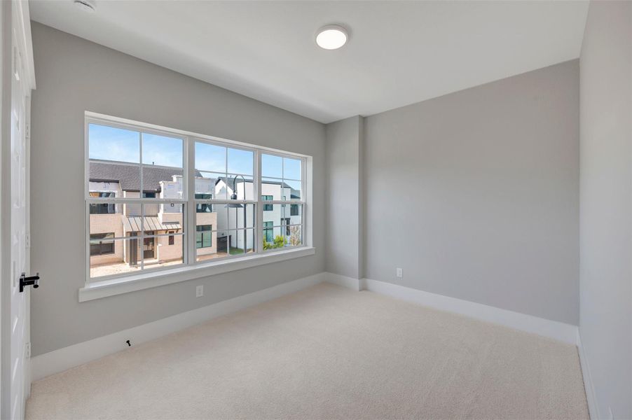 Spacious, unfurnished interior of a new home in Easthaven at Bridgeland Central - Vision Collection, Cypress (Image 21).