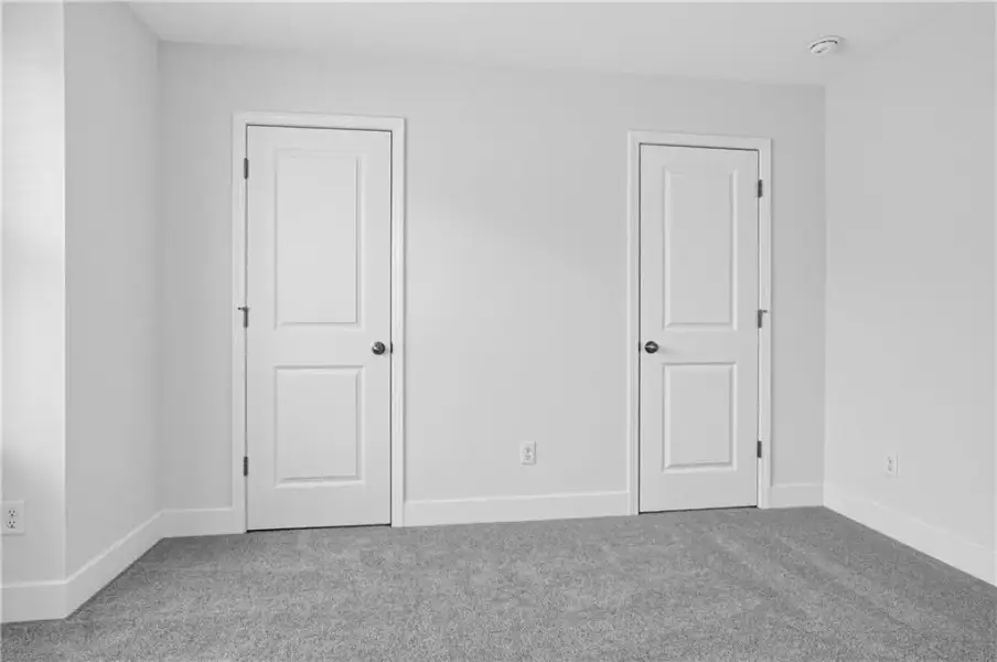 Spacious, unfurnished interior of a new home in Towns at Holly Springs, Holly Springs (Image 21). Spacious, unfurnished interior of a new home in Towns at Holly Springs, Holly Springs (Image 21).