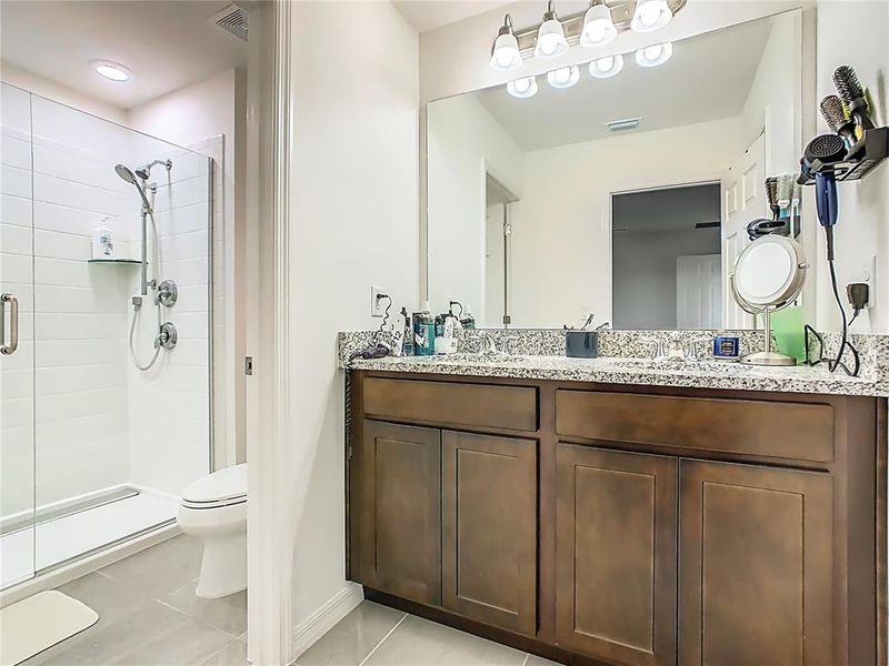 Furnished interior view inside a new home in Horse Creek at Crosswinds, Davenport (Image 7).