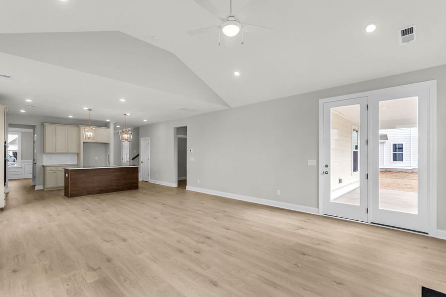 Spacious, unfurnished interior of a new home in Tidewater at Lakes of Cane Bay, Summerville (Image 26).