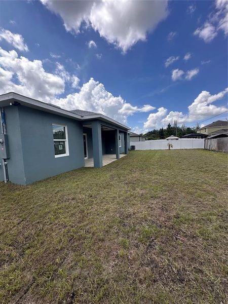 Front exterior of a new home in , Palm Bay, FL, highlighting curb appeal (Image 34). Front exterior of a new home in , Palm Bay, FL, highlighting curb appeal (Image 34).