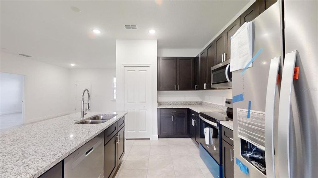 Furnished interior view inside a new home in , Dunnellon (Image 3).