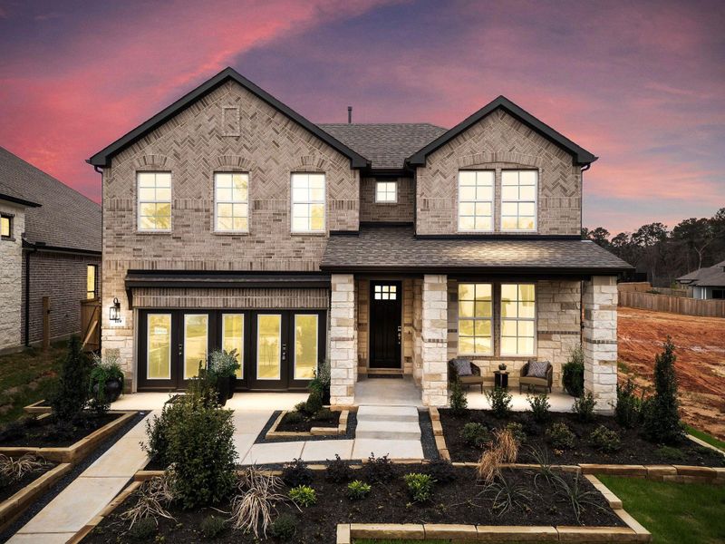 Front exterior of a new home in The Woodlands Hills, Willis, TX, highlighting curb appeal (Image 1). Front exterior of a new home in The Woodlands Hills, Willis, TX, highlighting curb appeal (Image 1).