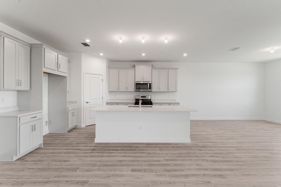 Furnished interior view inside a new home in Tradition - Cadence, Port St. Lucie (Image 6). Furnished interior view inside a new home in Tradition - Cadence, Port St. Lucie (Image 6).