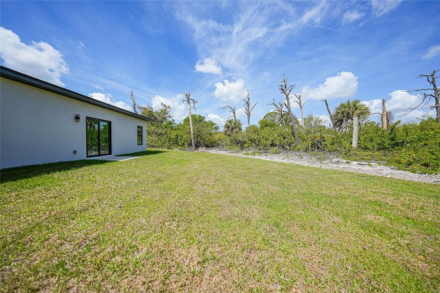 Exterior details and patio area of a home in , Port Charlotte (Image 4).