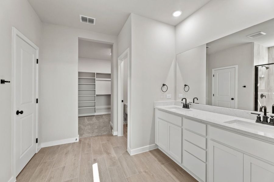 Representative furnished interior of a home built from the Tularosa by Hakes Brothers in Hickory Ridge, Elmendorf (Image 10).