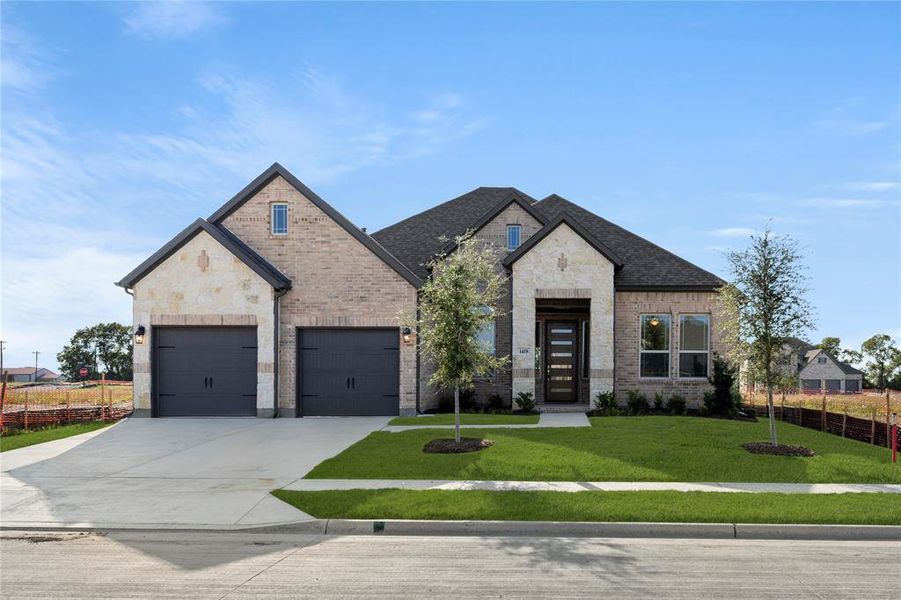 Front exterior of a new home in River Ranch, Van Alstyne, TX, highlighting curb appeal (Image 2). Front exterior of a new home in River Ranch, Van Alstyne, TX, highlighting curb appeal (Image 2).