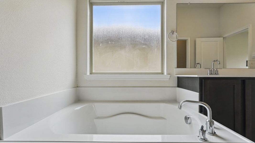 Representative furnished interior of a home built from the Ivery by D.R. Horton in Madera, Royse City (Image 11).