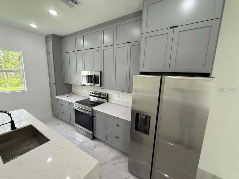 Furnished interior view inside a new home in , Lehigh Acres (Image 7). Furnished interior view inside a new home in , Lehigh Acres (Image 7).