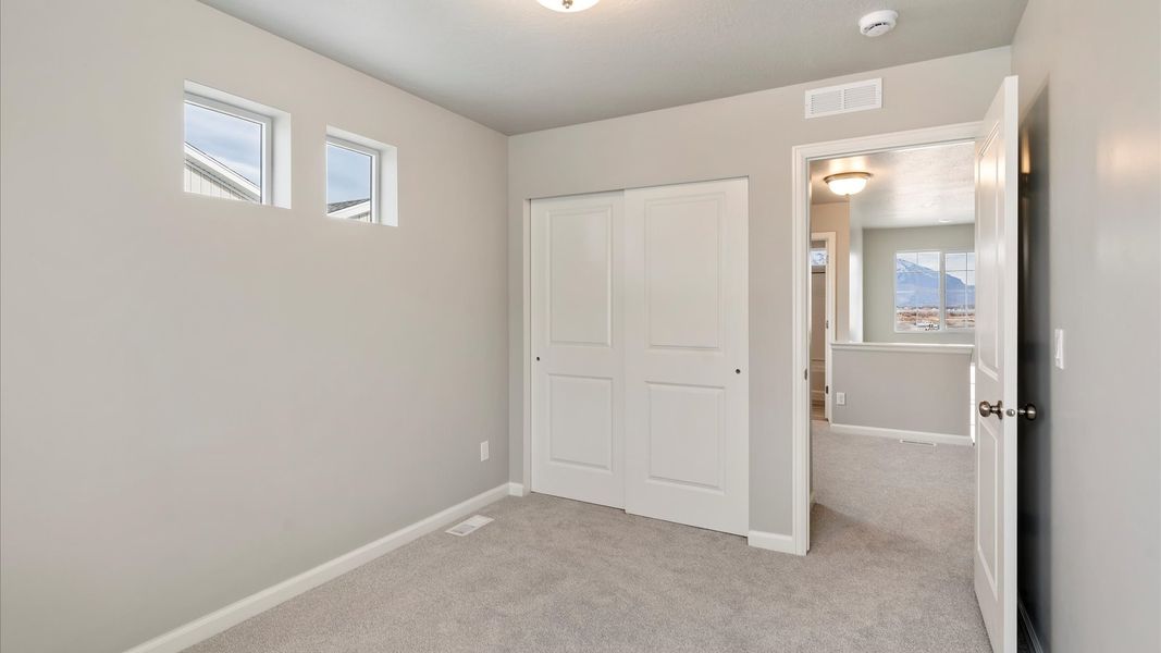 Spacious, unfurnished interior of a new home in Reunion, Commerce City (Image 25).