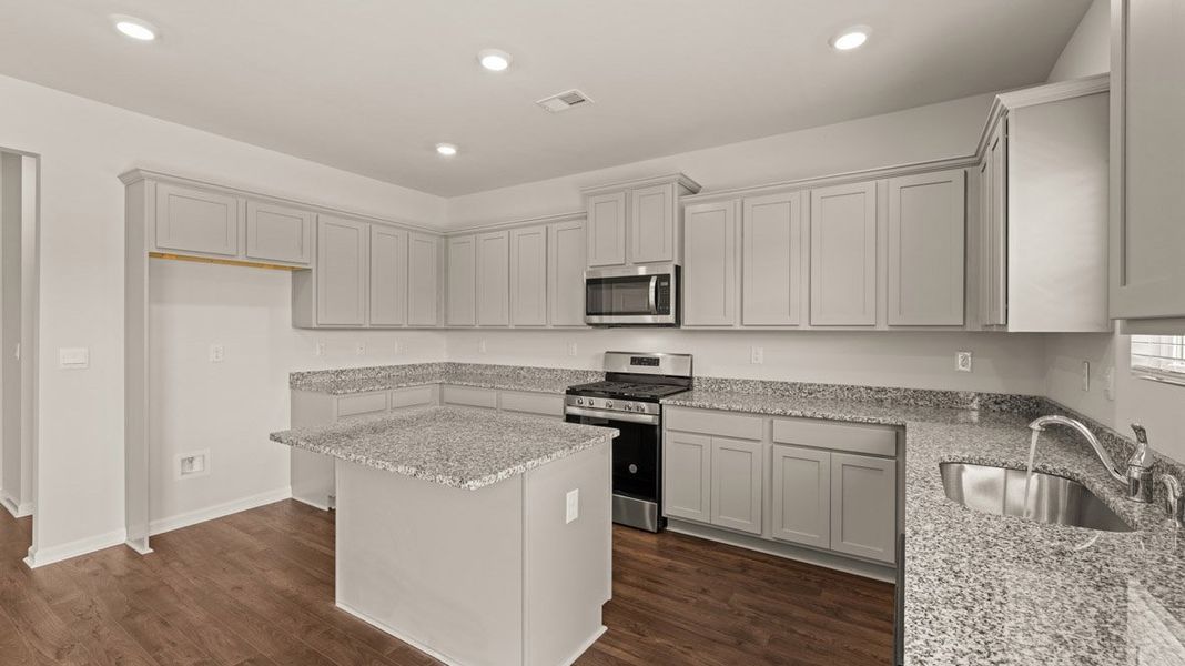 Representative furnished interior of a home built from the Grayson by D.R. Horton in Highland Hills, Graniteville (Image 7).