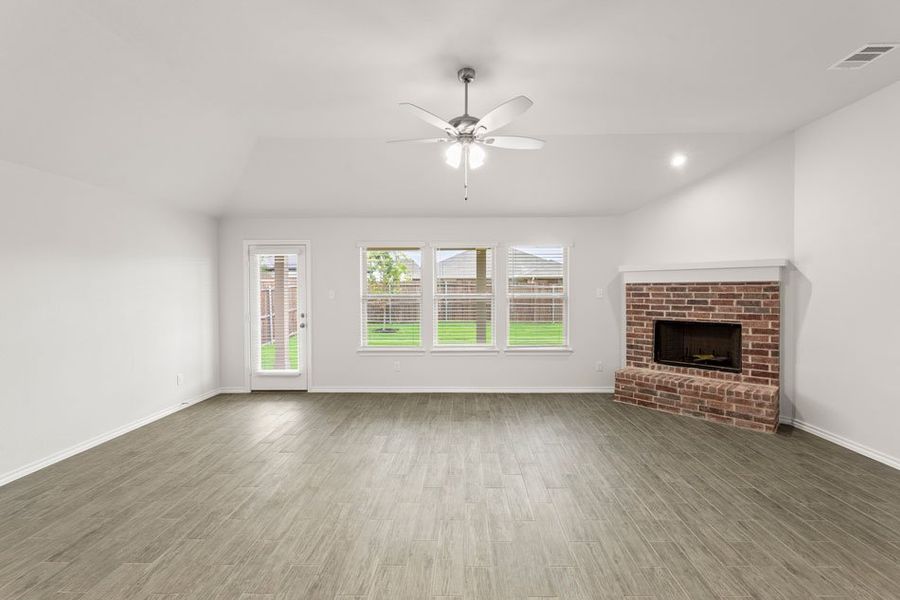 Representative exterior photo of a completed home built from the Lincoln by Impression Homes in DeBerry Reserve, Royse City, TX (Image 11).