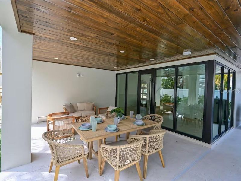 Exterior details and patio area of a home in , Bradenton Beach (Image 4).