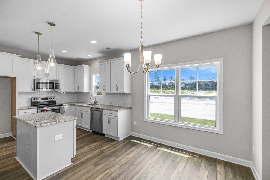 Representative furnished interior of a home built from the Magnolia by Caviness & Cates Communities in Bartlett Manor, Youngsville (Image 169).