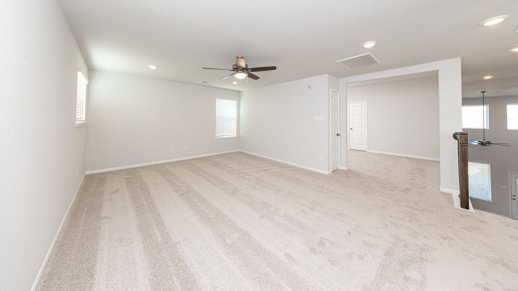 Representative unfurnished interior of a home built from the The Hawthorn by Legend Homes in Rocky Creek Crossing, Crowley (Image 23).