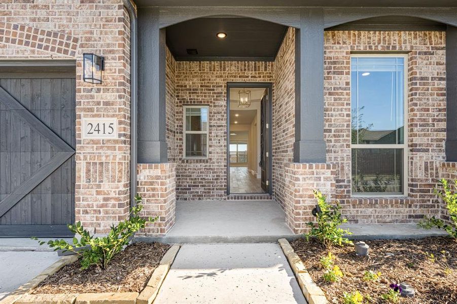 Exterior details and patio area of a home in Sonoma Verde, McLendon-Chisholm (Image 19).