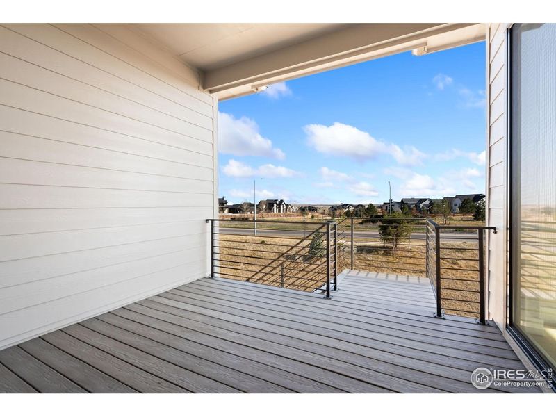 Exterior details and patio area of a home in Festival at RainDance, Windsor (Image 2).