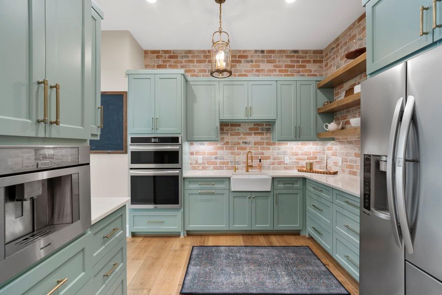 Butlers Pantry also has a full pantry that walks thru from garage door entry side. Not shown.