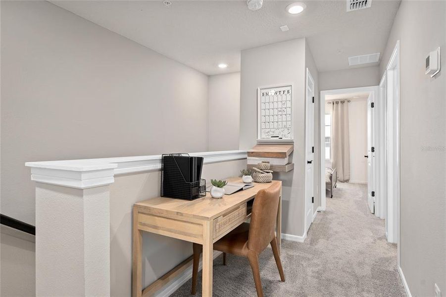 Furnished interior view inside a new home in Parkside Trails, Clermont (Image 7).