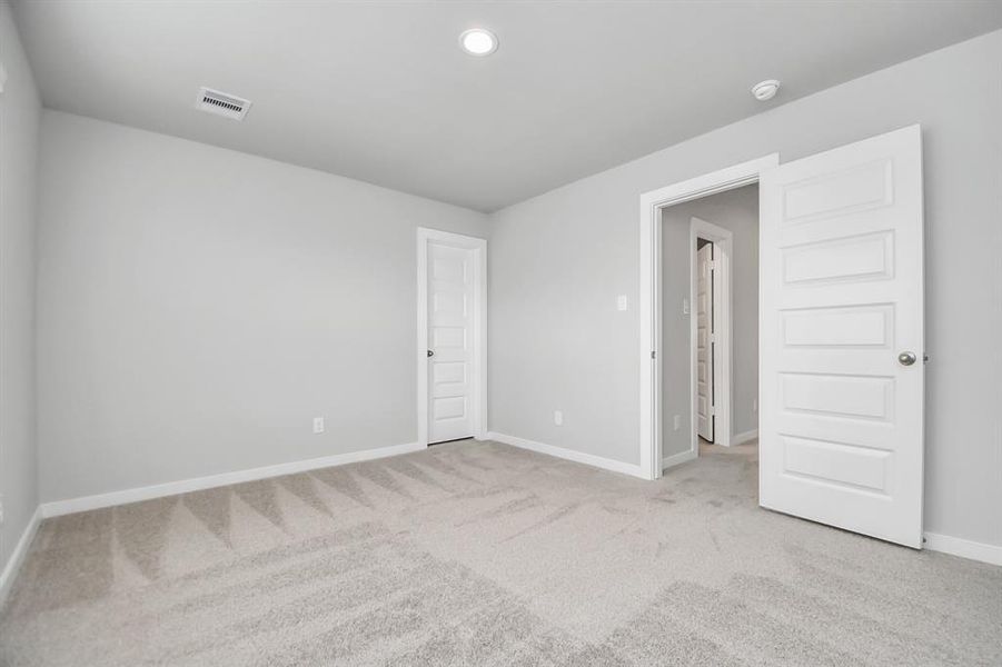 Generously sized secondary bedrooms, complete with spacious closets and soft, inviting carpeting. Enjoy abundant natural light streaming in through the large windows, complemented by privacy blinds for your personal sanctuary.