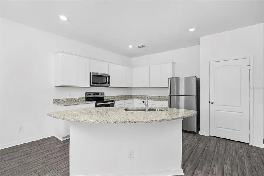 Furnished interior view inside a new home in , Poinciana (Image 3).