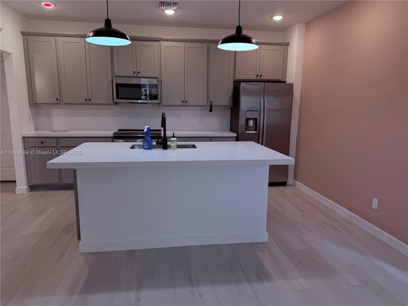 Furnished interior view inside a new home in , Port St. Lucie (Image 7).